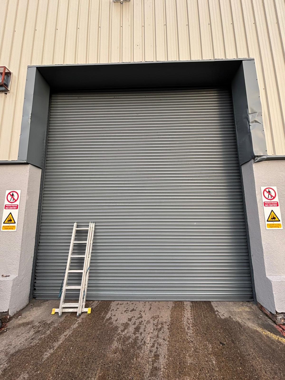 Complete warehouse exterior with restored roller shutter