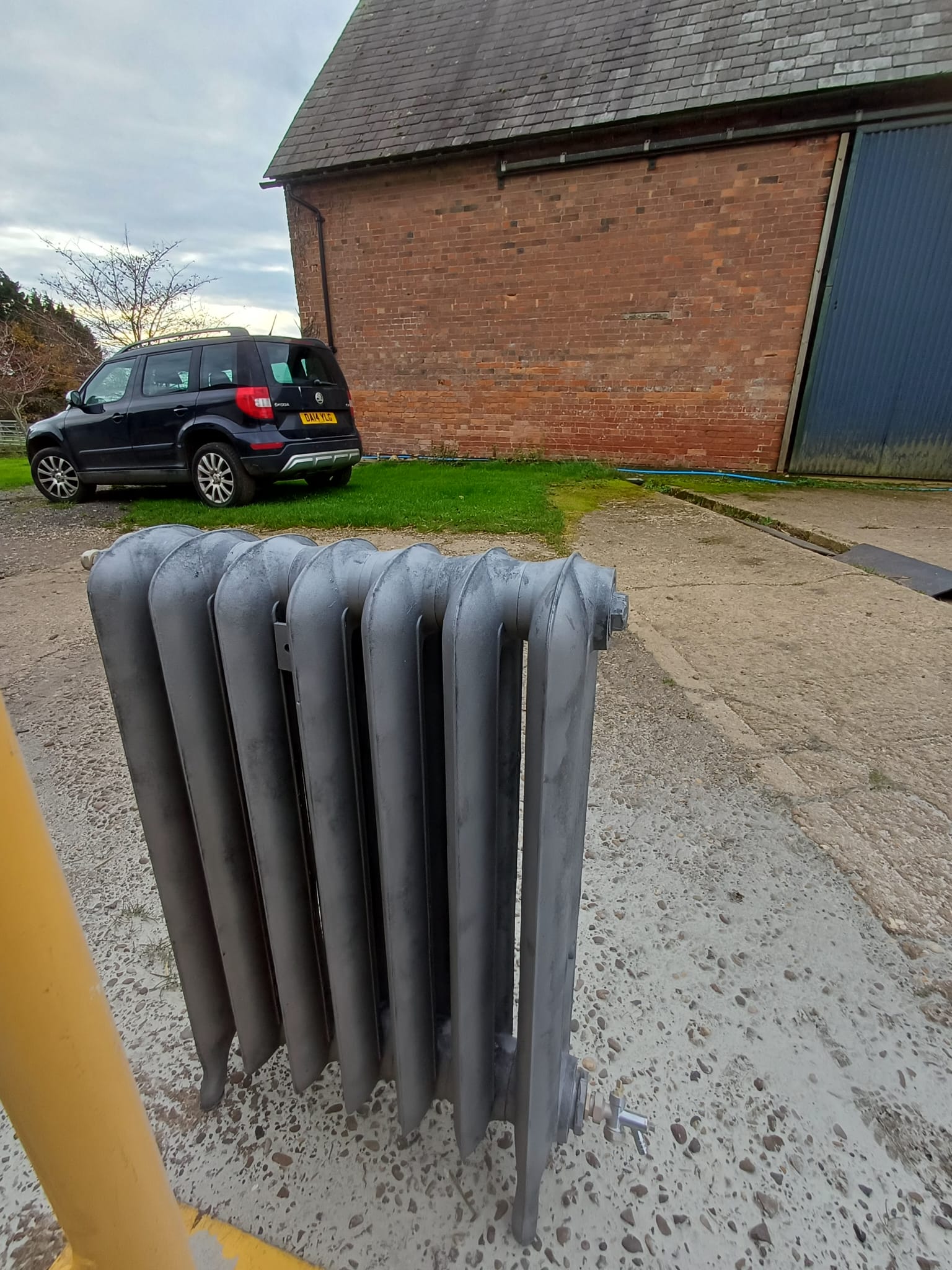 Restored radiator showing preserved decorative features